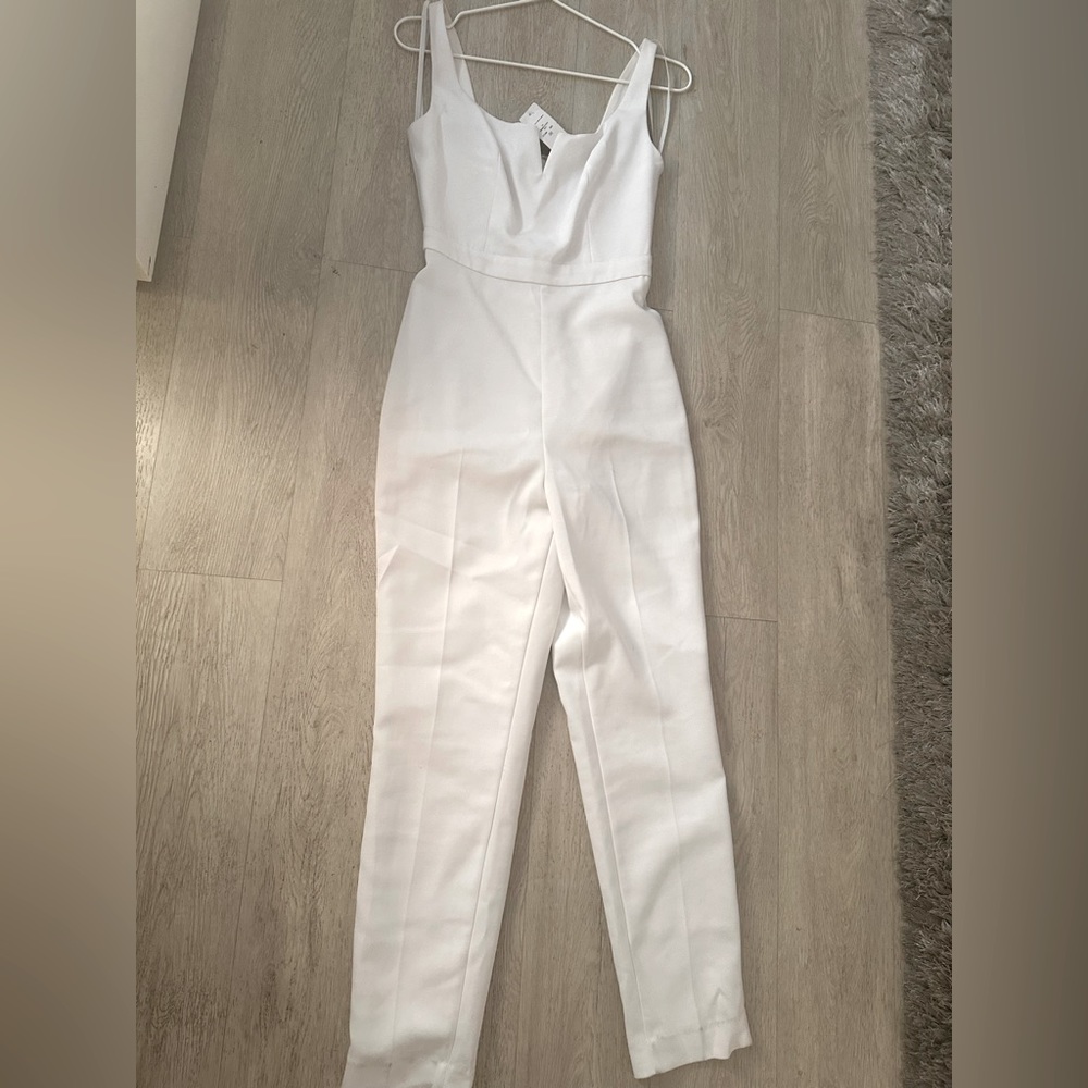 BEBE NWT WHITE JUMPSUIT